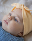 1+ in the family - noa - muslin headband - peach